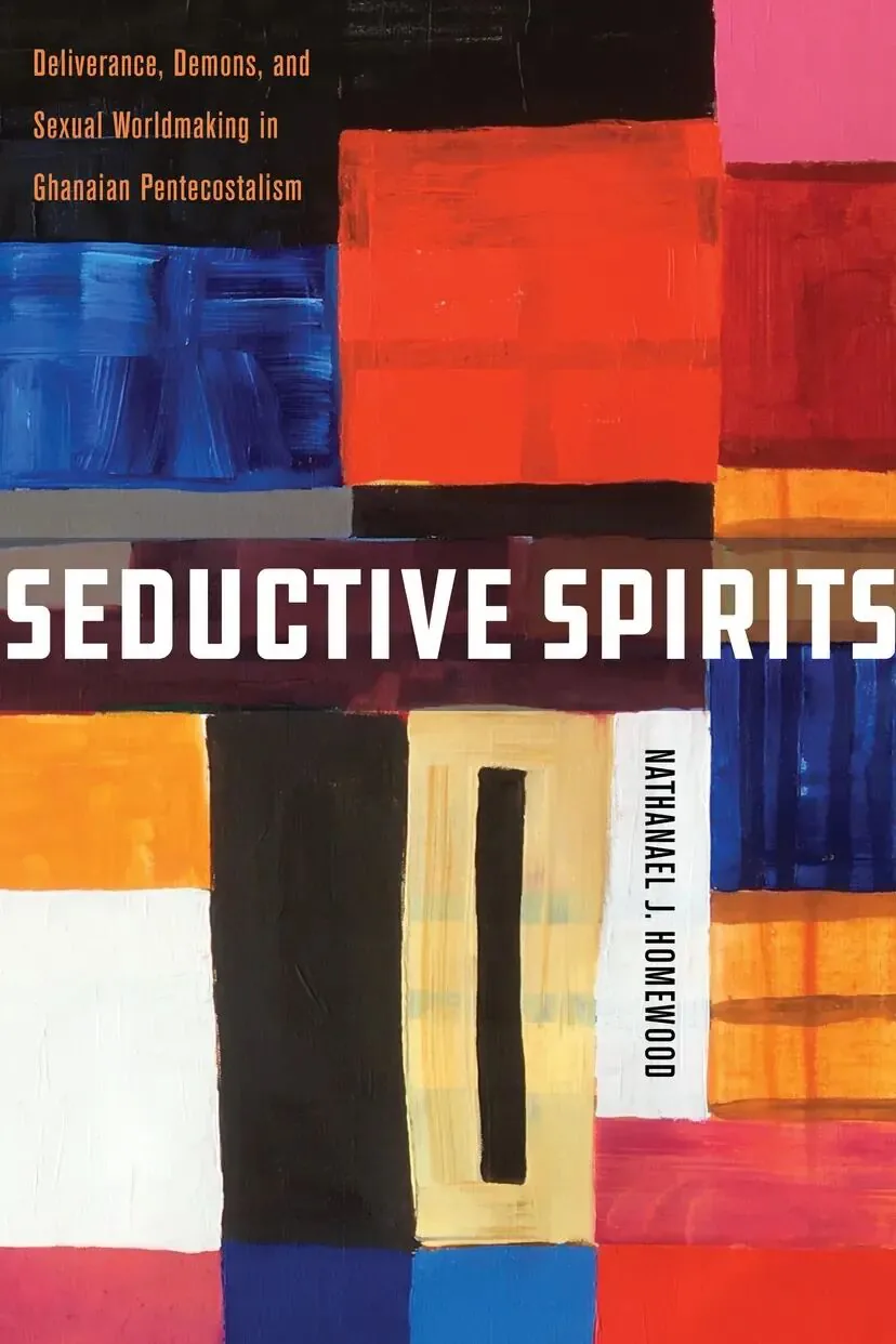 书封《Seductive Spirits: Deliverance, Demons, and Sexual Worldmaking in Ghanaian Pentecostalism》，作者 Nathanael J. Homewood；蓝红橙黑等色块拼接的抽象几何设计。