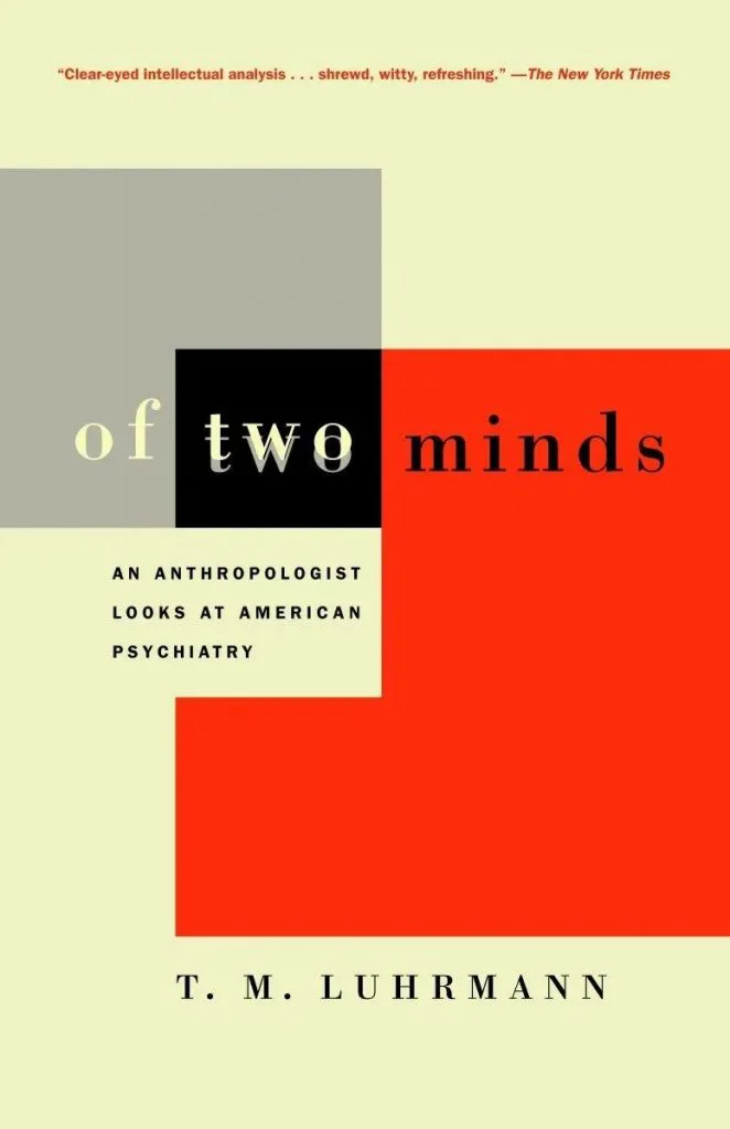 书封面,书名《Of Two Minds: An Anthropologist Looks at American Psychiatry》,作者T. M. Luhrmann,米黄底色上以灰、黑、橙红色几何色块拼接的极简设计,上方印有一句书评引文。