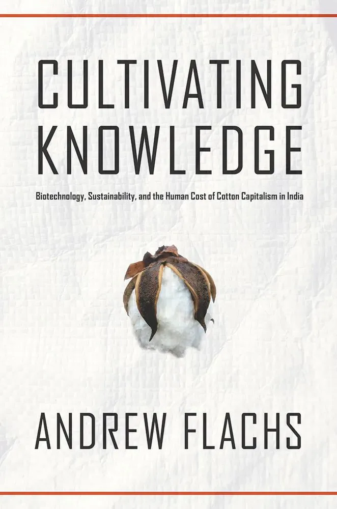 白色封面,红色细线边框,中央印一朵棉花照片,上方为英文书名“CULTIVATING KNOWLEDGE”及副标题,下方是作者英文名“ANDREW FLACHS”。