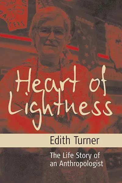 暖红色调封面,印有伊迪斯·特纳的肖像照,书名《Heart of Lightness》,副标题The Life Story of an Anthropologist。